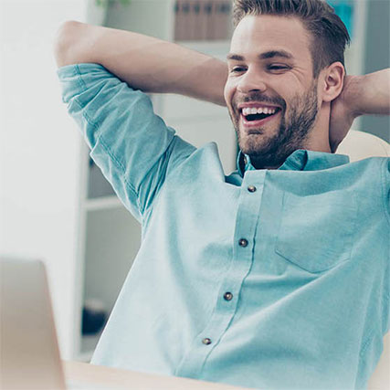 happy man at computer
